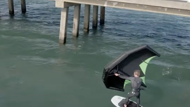 Wing Foiling under a bridge! #shorts