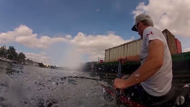Bow Surfing an OC1 on a Freighter Wake.