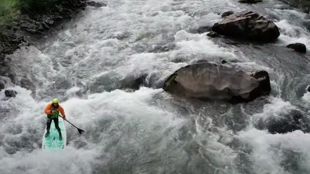 Ambassador Patrick Müller Whitewater SUPing on the Muota River