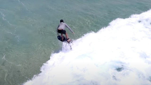 ADAM BENNETTS FOILING WITH HARD FIZZ IN BYRON BAY