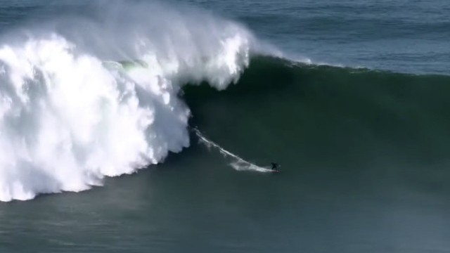 Justine Dupont Surfs Nazaré's Praia do Norte During the "Swell of the Century"