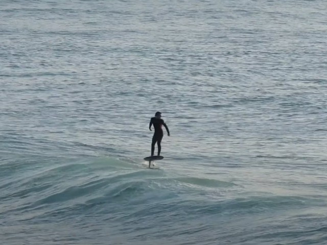 Sunny spring evening hydrofoiling in Newquay, England