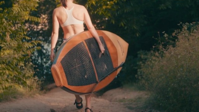 Jarvis Boards wood paddle board in action.