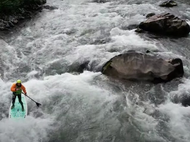 Ambassador Patrick Müller Whitewater SUPing on the Muota River