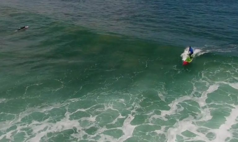 SUP Surfing with dolphins Bells Beach