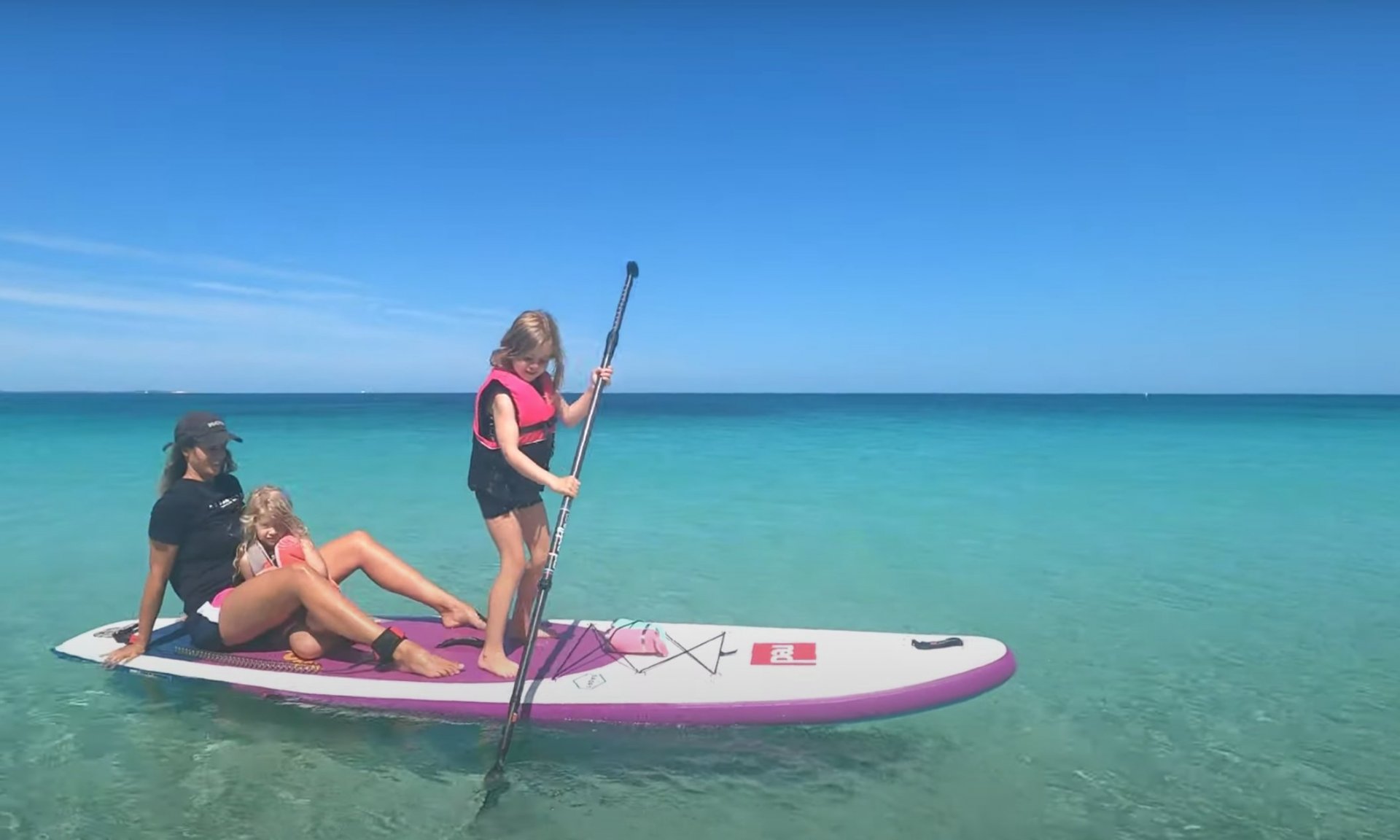 Red Shorts: Paddleboarding with children