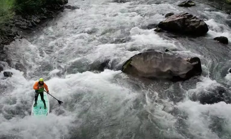 Ambassador Patrick Müller Whitewater SUPing on the Muota River