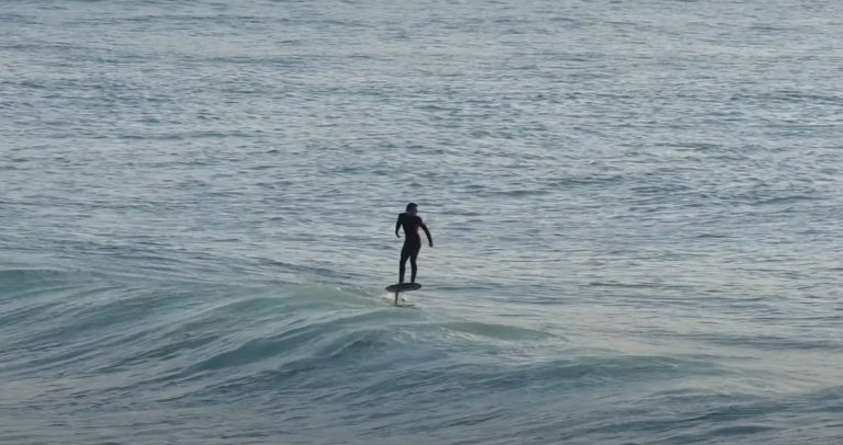 Sunny spring evening hydrofoiling in Newquay, England