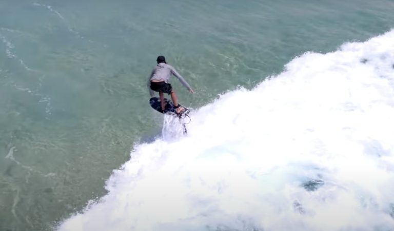 ADAM BENNETTS FOILING WITH HARD FIZZ IN BYRON BAY