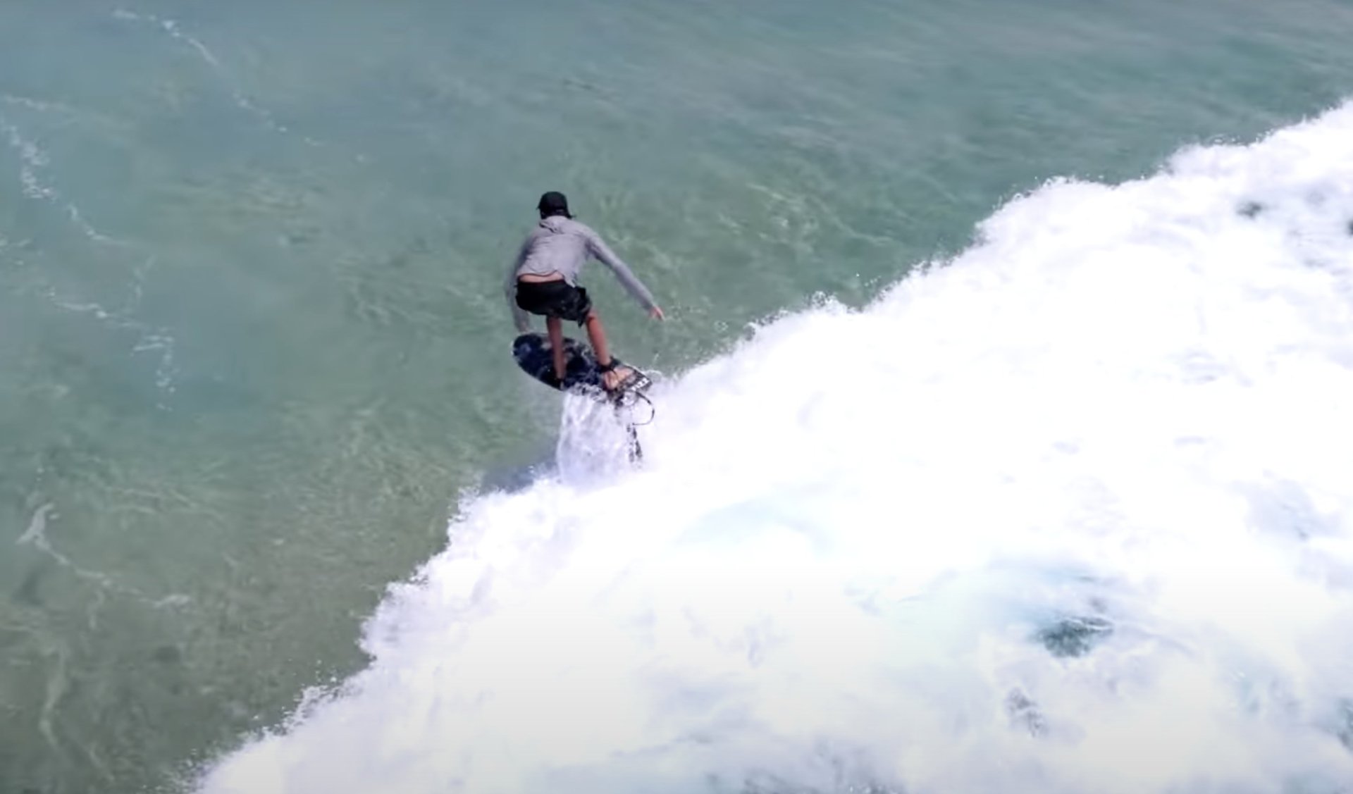 ADAM BENNETTS FOILING WITH HARD FIZZ IN BYRON BAY