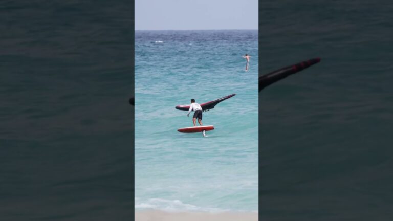 Side off small wave wing foil session in Florida