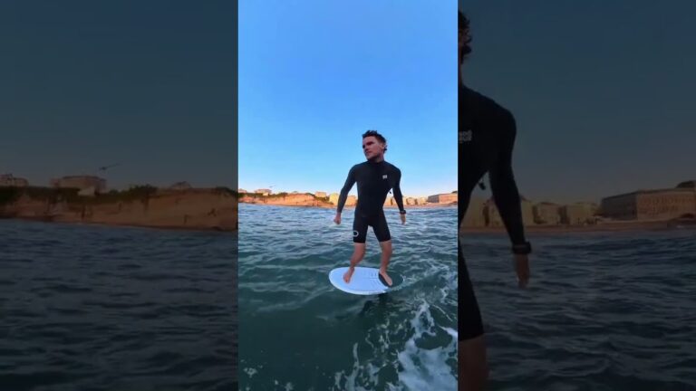 Foil Surfing thru a rock
